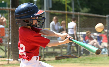 Baseball player batting.