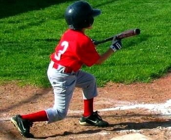 Baseball player batting.