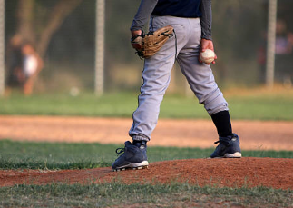 Baseball player batting.